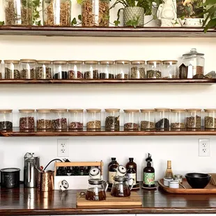 a shelf of herbs and spices