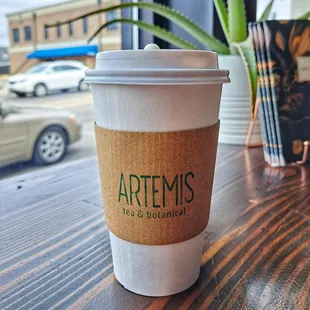 a coffee cup on a table