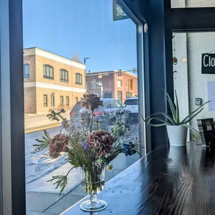 a view of a street through a window