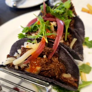 Birria Tacos. Appetizer size. Tasty.