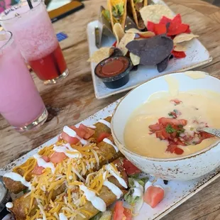 Prickly Pear Marg, Strawberry Marg, Flautas, Queso Dip, and Beef Tacos