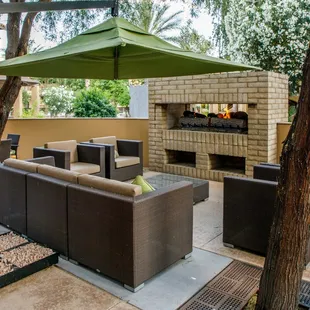 Lounge in front of our outdoor fireplace