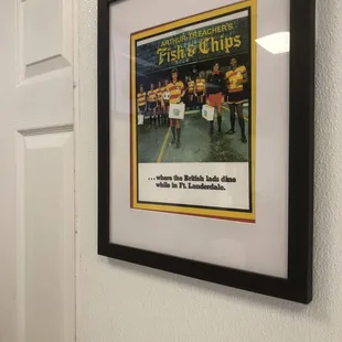 a picture of a poster hanging on a wall