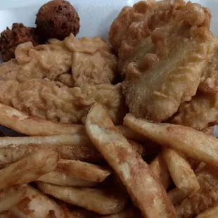Fish, chicken, chips, and hush puppies