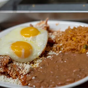 Chilaquiles  egg  w rice and beans