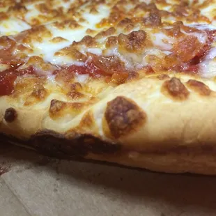 a close up of a pizza