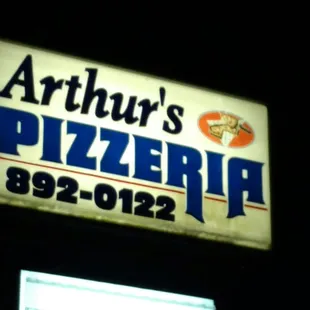 a sign for arthur&apos;s pizzaria