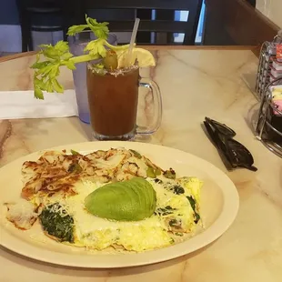 Mama&apos;s omelette, home frys  and a Bloody Mary.