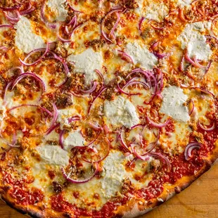 a pizza with cheese and onions