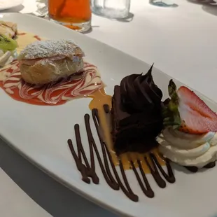 Dessert sampler with cherry studel, strawberry eclair and chocolate too!