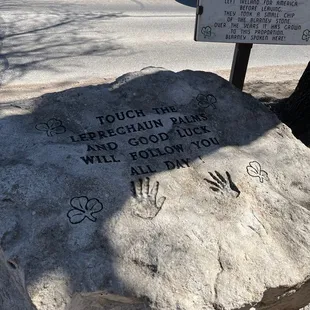 handprints on a rock