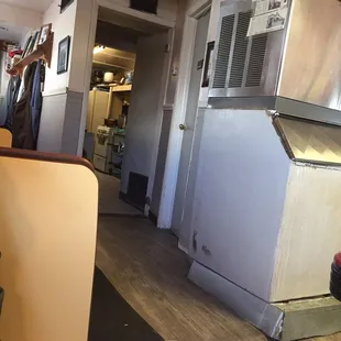 a kitchen with a refrigerator