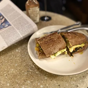 Fallin' for You ... sweet potato hash, kale, egg, cheddar, etc. on Motzi baguette