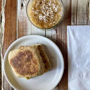 Egg and cheese on muffin and iced flat decaf