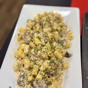 Maccheroni (Egg Pasta) with Creamy Gorgonzola Sauce and walnuts Maccheroni (egg pasta) Creamy Sausage and Mushrooms