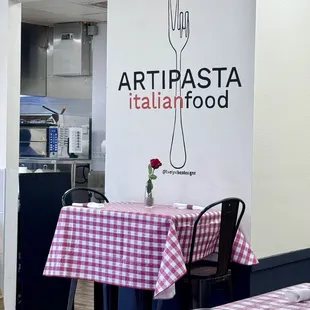 a table and chairs in a restaurant