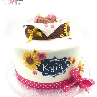 a cake with a teddy bear on it