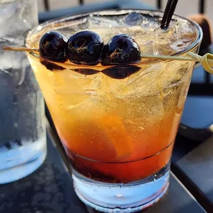 Ron and Mary&apos;s Brown Mumbler with rye bourbon, orange, brown sugar