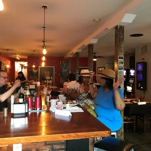 people sitting at the bar
