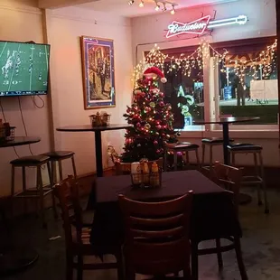 a christmas tree in the corner