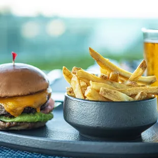 a burger and fries on a plate