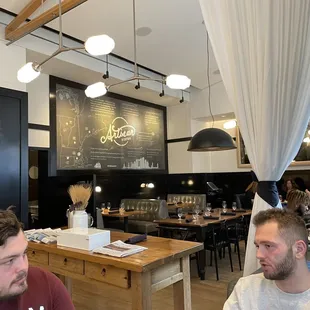 two men sitting at a table