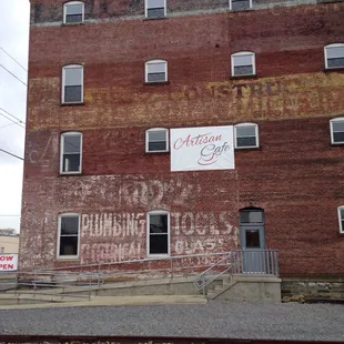Side entrance of the cafe located in a renovated 19th century building.