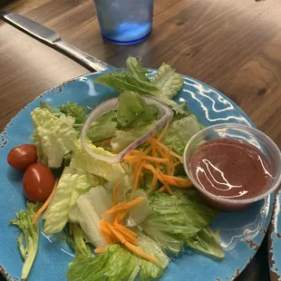 Side salad with raspberry vinaigrette. Very tasty.