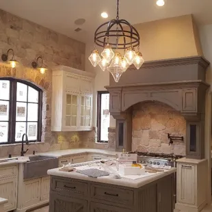 Natural stone backsplash.