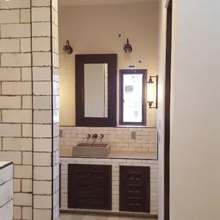 a bathroom with a double sink