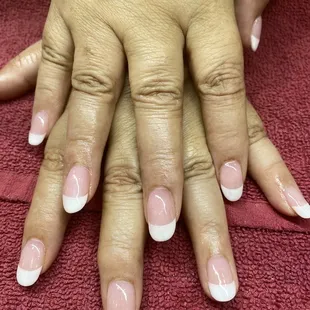 Mya from Artistic nails  this was an SNL on my nails very good service I recommend her for a good pedicure and manicure .
