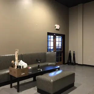 a living room with couches and a coffee table