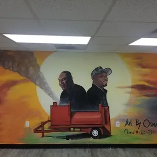 two men in a wagon with smoke coming out of it