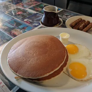 Two Pancakes, Two Eggs And 4 Strips Bacon Or 4 Sausages