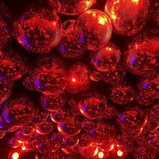 Ceiling in Arts Club Cabaret Room has 350 mirrored balls of various sizes.