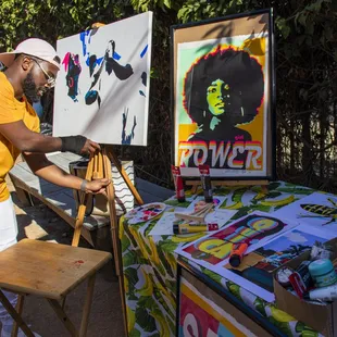 Who is Vlad live painting alongside his latest art pieces at the LB Art Walk