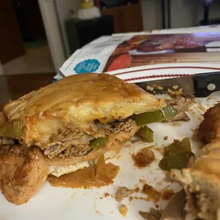 Roast beef sandwich cut in half. More bread, less meat.