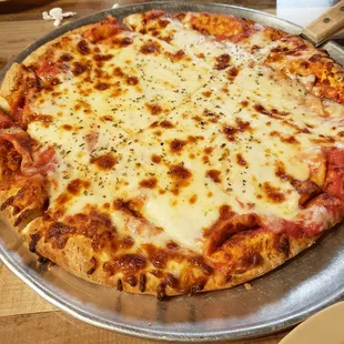 Cheese Pizza (Extra Cheese)   The taste of the mozzarella on this cheese pizza is out of this world and, phenomenally mind blowing!!