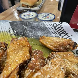 a plate of fried chicken wings