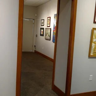 Small room off of the main area with more art