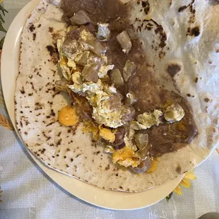 Bacon, egg, potato, beans, cheese