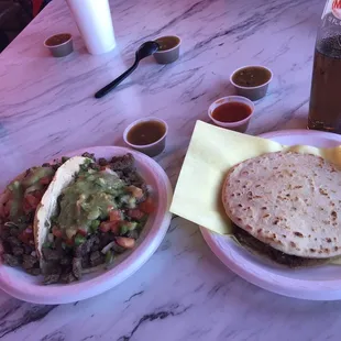 Carne asada tacos and barbacoa gordita.