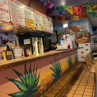 the inside of a mexican restaurant