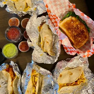 a variety of sandwiches and condiments