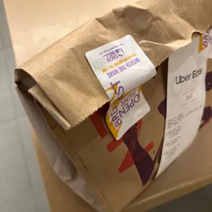 a brown paper bag on a table