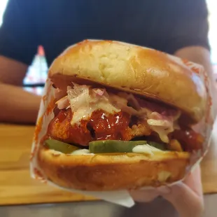 Nashville Hot. Chicken, Classic Mayo, Pickles, Slaw, Nashville Hot Sauce.