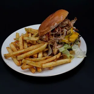 a plate with a sandwich and french fries