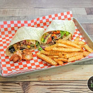 a wrap and fries on a tray