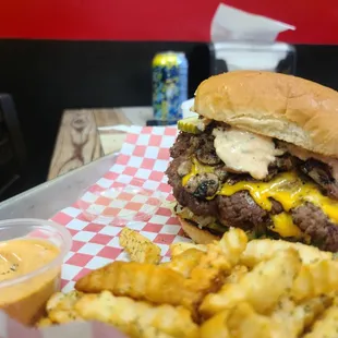 Loaded smash burger with fries.