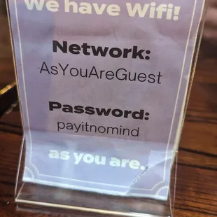a sign that says we have wifi